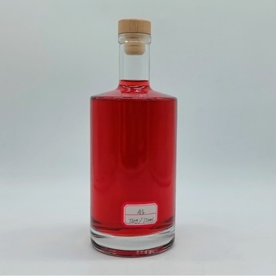 Bottiglia di vetro trasparente di lusso per il whisky Logo personalizzato Forma rotonda Bottiglie di liquore di vetro da 750 ml