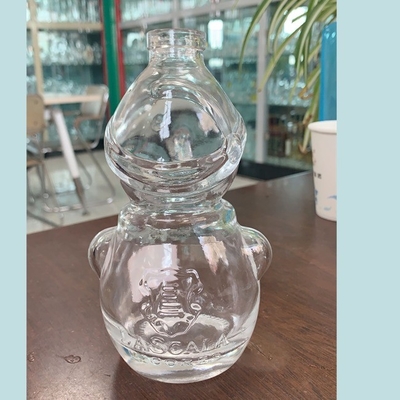 Bottiglia di whisky a forma di pupazzo di neve in vetro trasparente con manipolazione superficiale Decal