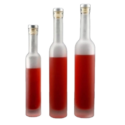 Esemplare gratuito di bottiglie di liquore in vetro da 1 litro con superficie deccale e tappo di sughero