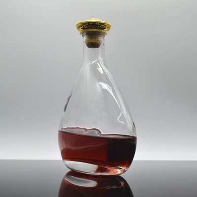 Bottiglie rotonde di vetro Super Flint per whisky in liquori