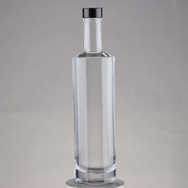 Bottiglie di whisky con tappo di Guala in rilievo